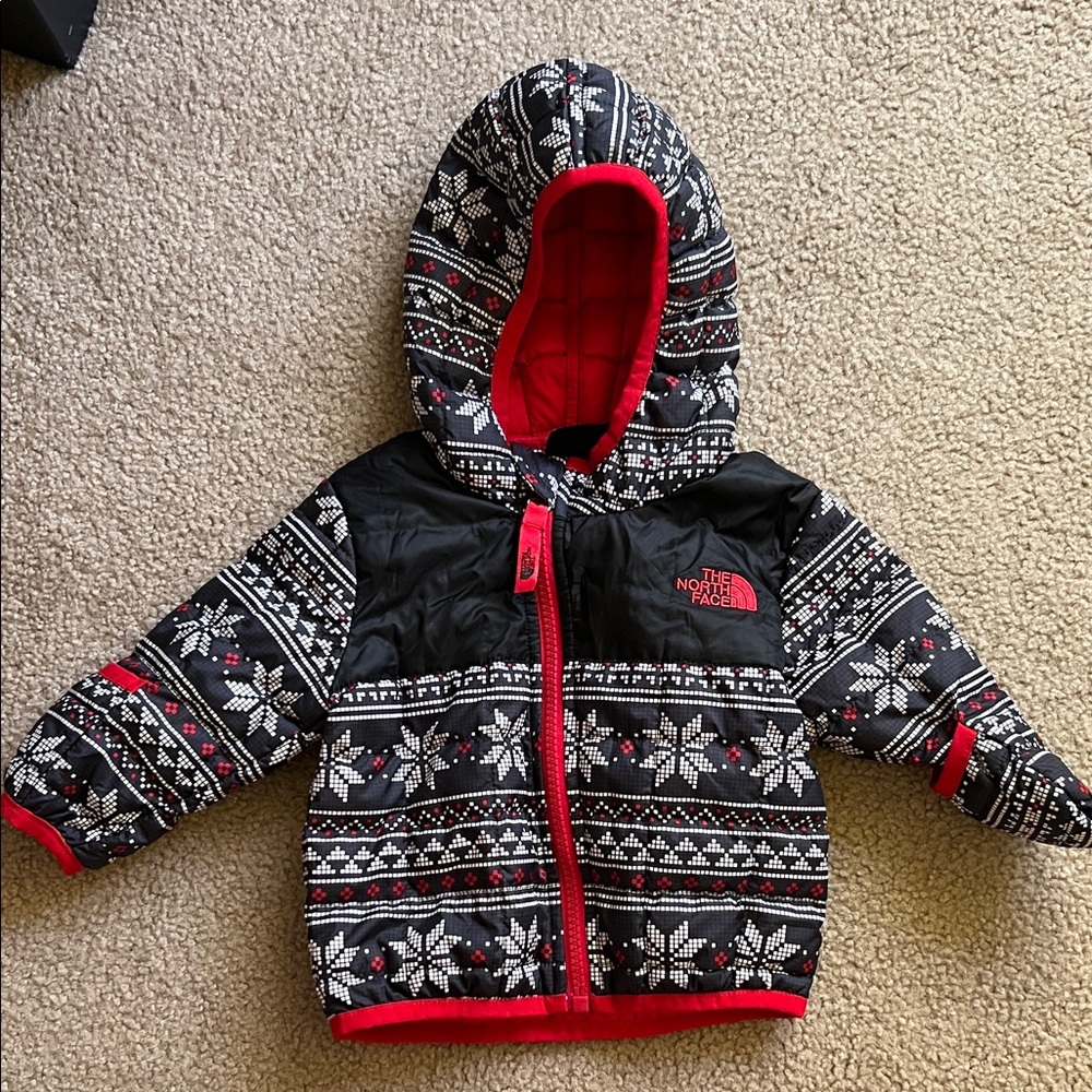 The North Face Black and Red Snowflake puffer jacket
